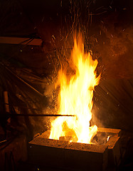 Image showing smithy fire with sparks