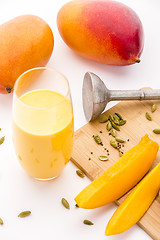 Image showing Mango Yoghurt Drink, Cardamon And Fruit Flesh