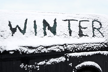 Image showing Snowed car in winter