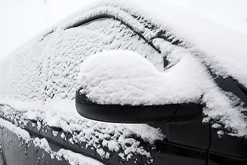 Image showing Snowed car in winter