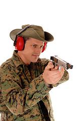 Image showing Soldier pointing a pistol.