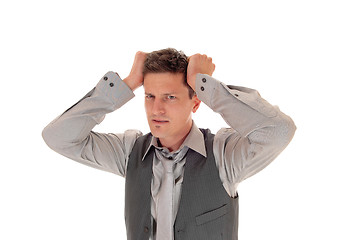 Image showing Man scratching his head.