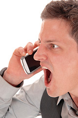 Image showing Man screaming in cell phone.