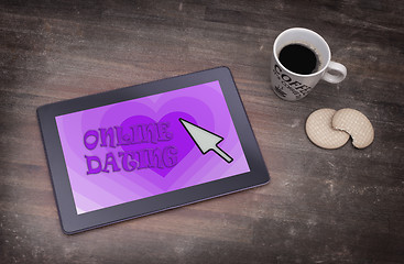 Image showing Online dating on a tablet