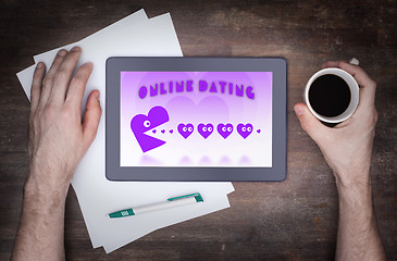 Image showing Online dating on a tablet