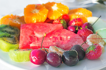 Image showing Fruit dessert, diverse fruits and berries.