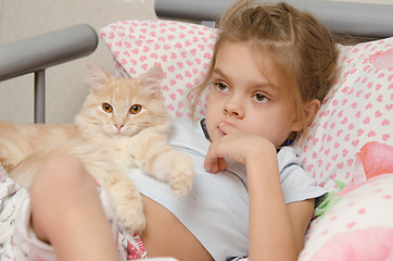 Image showing Portrait of the girl with a cat