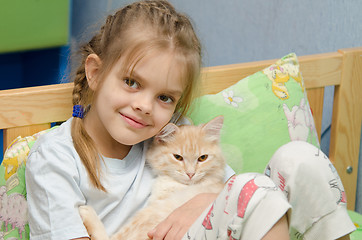 Image showing Portrait of the girl with a cat