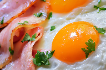 Image showing breakfast with bacon and fried eggs