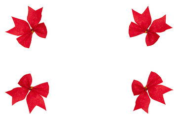 Image showing Frame with red ribbon bows isolated on the white background