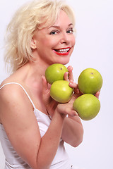 Image showing Woman offers to apples