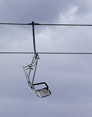 Image showing Chair-lift and gray sky