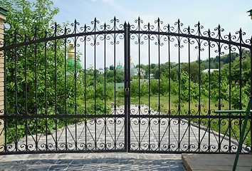 Image showing Golden domes of Kiev Pechersk Lavra Monastery in Kiev, Ukraine seen through the gate