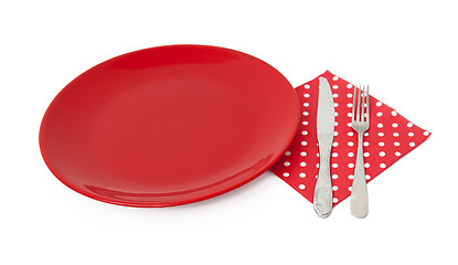 Image showing Red plate and cutlery