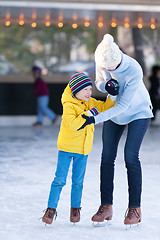 Image showing family ice skating