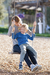 Image showing family at swings