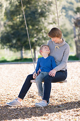 Image showing family at swings