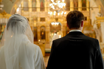 Image showing Young pair gets married in church