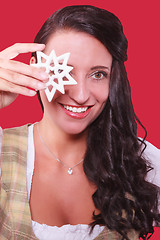 Image showing Woman with Poinsettia