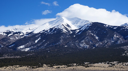 Image showing High mountain covers by snow in the winter