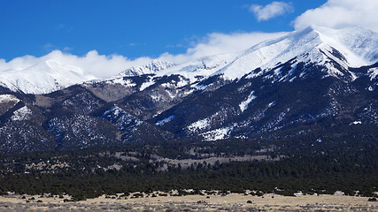 Image showing High mountain covers by snow in the winter