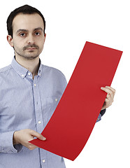 Image showing Man holding a paper