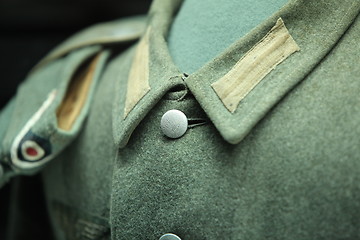 Image showing button on a soldier's uniform