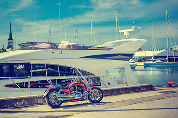 Image showing Beautiful bike on the pier on the background of yachts. Cross pr