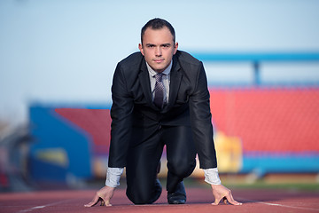 Image showing business man ready to sprint