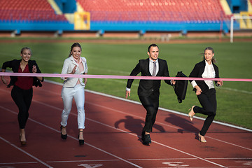 Image showing business people running on racing track