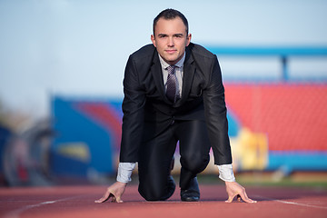 Image showing business man ready to sprint