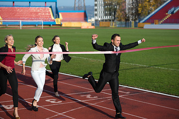 Image showing business people running on racing track