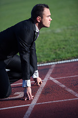 Image showing business man ready to sprint