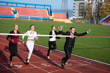 Image showing business people running on racing track