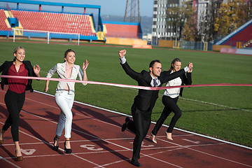 Image showing business people running on racing track