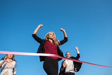 Image showing business people running on racing track