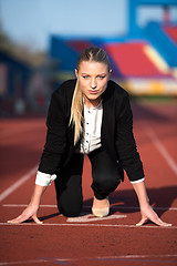 Image showing business woman ready to sprint