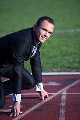 Image showing business man ready to sprint