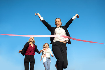 Image showing business people running on racing track