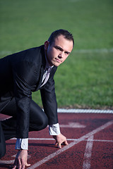 Image showing business man ready to sprint