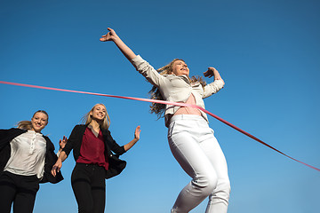 Image showing business people running on racing track