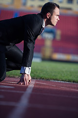 Image showing business man ready to sprint