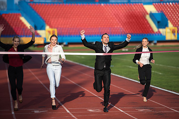 Image showing business people running on racing track