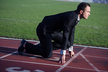 Image showing business man ready to sprint