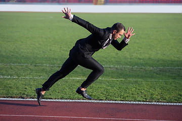 Image showing business man ready to sprint