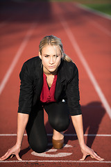 Image showing business woman ready to sprint