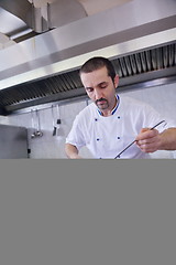 Image showing chef preparing food