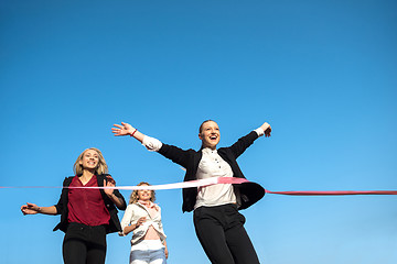 Image showing business people running on racing track