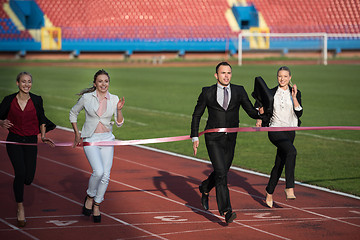 Image showing business people running on racing track