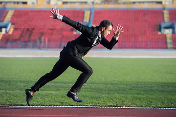 Image showing business man ready to sprint